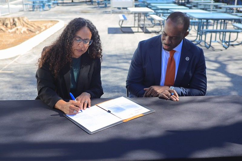 Kim Signing Road Safety Initiative